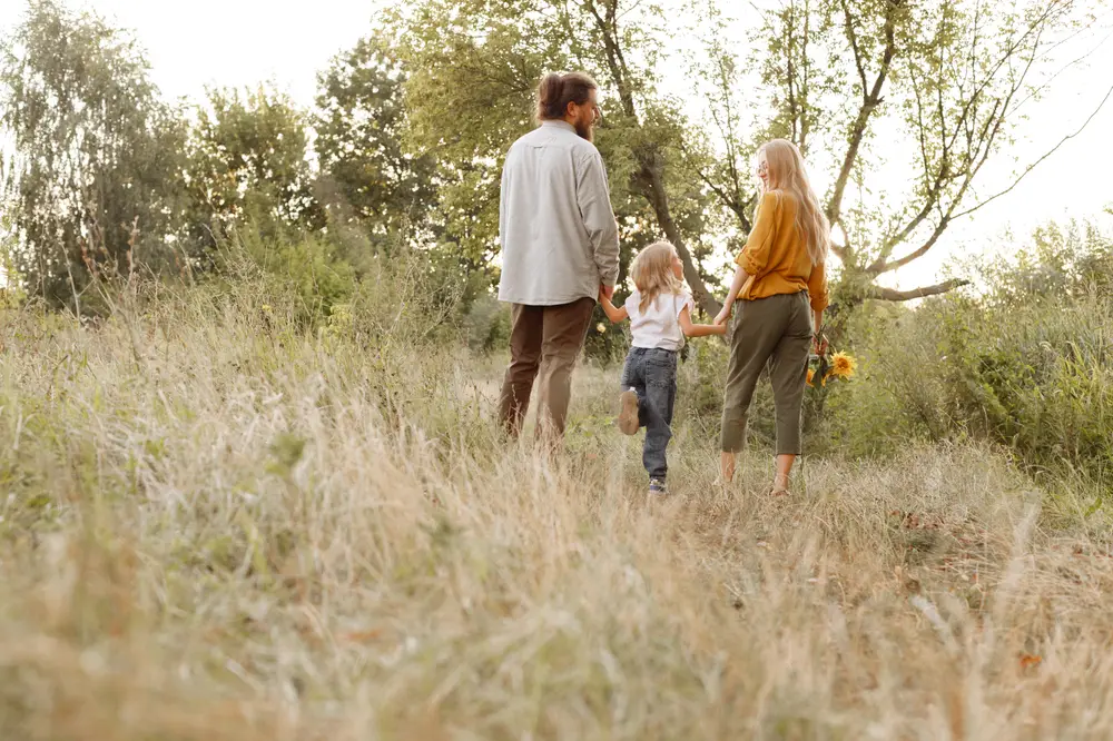 Family walking together outdoors in Liberty County, Texas
